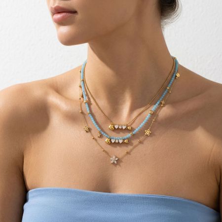 Colliers pendentifs pour femmes en acier inoxydable, couleur or, avec perles de forme irrégulière en forme de poisson et zircon.