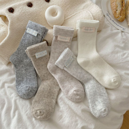Chaussettes mi-mollet à lettres unies basiques et légèrement rebondissantes