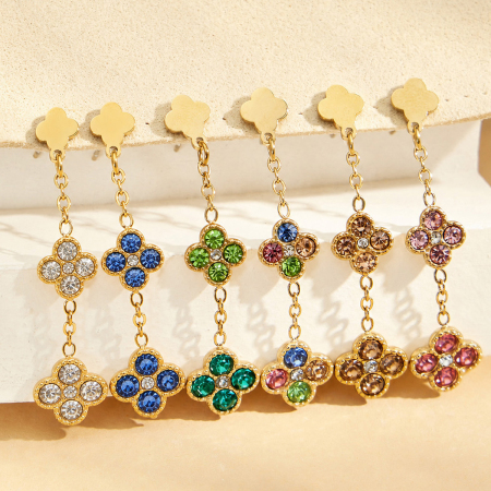 Boucles d'oreilles pendantes pour femme, élégantes et raffinées, en acier inoxydable doré, ornées de zircon et d'un motif floral. Collection Luxueuse.