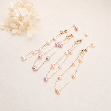 Bracelet de perles pour femme, collection Simple, composé d'une chaîne de perles d'eau douce couleur or.
