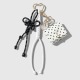 1 breloque de sac blanche