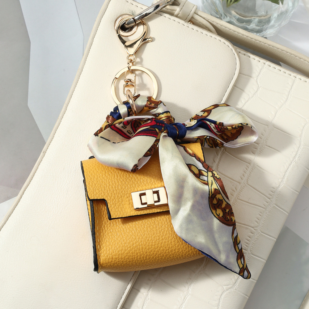 Breloques De Sac En Alliage Uni, Motif Nœud Papillon Quotidien, Série Simple, Étui À Écouteurs Image4