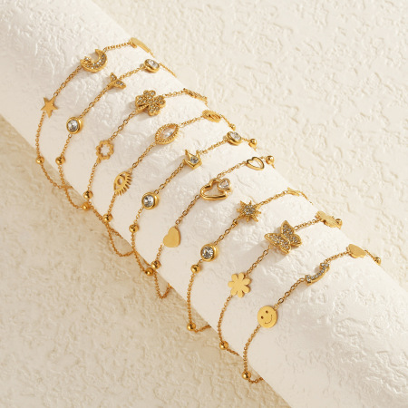 Bracelet à breloques élégant en acier inoxydable, couleur or, avec pendentif cœur, étoile et couronne, style simple et élégant. 2