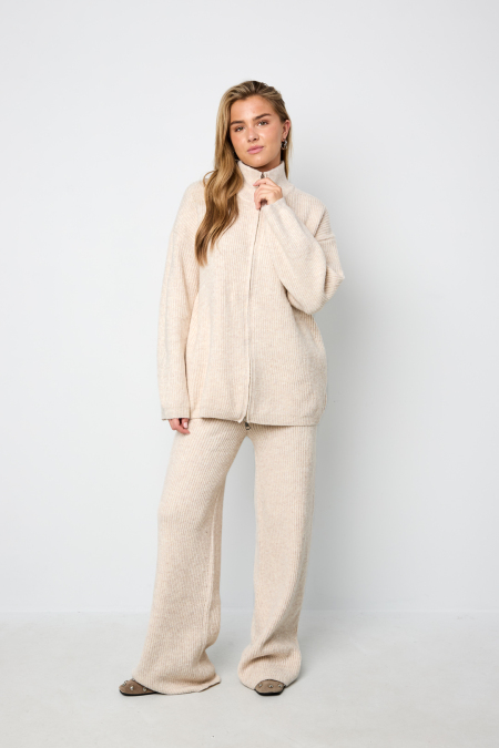 Le set de vêtements coordonnés d'hiver