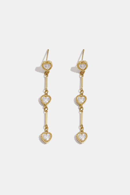 Boucles d'oreilles pendantes en acier inoxydable, chaîne élégante, collection luxueuse pour femmes, idéales pour les fêtes et les soirées.