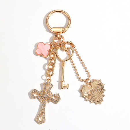 Porte-clés luxueux et décontracté en forme de cœur et de croix, avec cadenas trèfle et strass, en alliage.