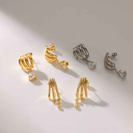 Boucles d'oreilles pendantes élégantes pour femme, en acier inoxydable doré, de forme géométrique. 2