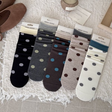 Chaussettes mi-mollet à motif rétro et couleurs contrastées, légèrement rebondissantes
