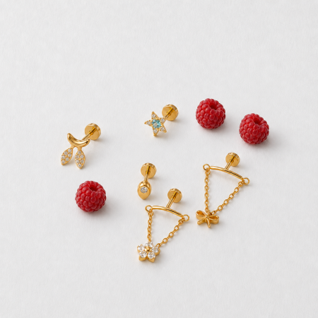 Boucles d'oreilles piercing femme en titane doré avec zircon et nœud papillon en forme d'étoile (1 pièce).
