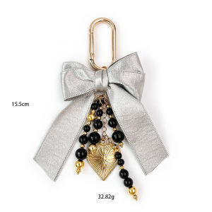 Collection Luxueuse De Breloques Pour Sac En Alliage Avec Nœud Papillon Et Perles En Forme De Cœur h5 Image5